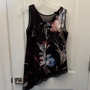 White House Black Market Black Floral Asymmetrical Blouse with ruffle bottom